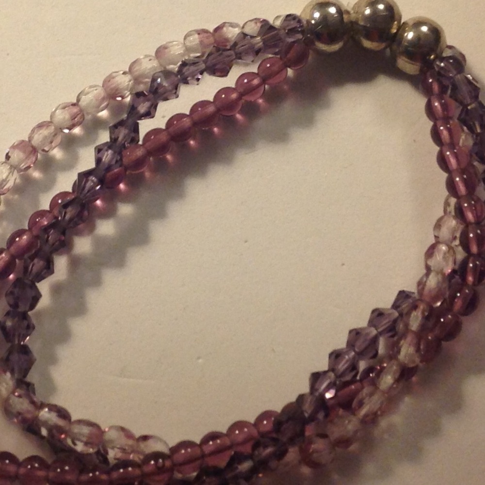 Handcrafted 3 strand bracelet with a twist